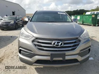 2018 Hyundai Santa Fe 2.4L z VIN 5NMZT3LB7JH080380, wystawiony jako Copart lot #54016805 z przebiegiem 138 494 mil mil oraz Nie do naprawy • Non repairable. Historia ofert i sprzedaży dostępna na DreamBid. Obrazek 5.