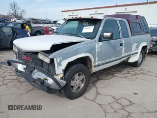 1993 GMC Sierra 1500 with VIN 2GDEK19K3P1548269, listed as a IAAI auction lot 41649617 with 251,363 mi miles and . Bid and sale history available at DreamBid. Image 2.