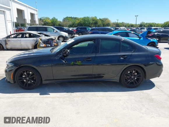 2022 BMW 3 Series 330i with VIN 3MW5R1J08N8C38592, listed as a IAAI auction lot 41832394 with 48,980 mi miles. Bid and sale history available at carsss.com. Image 14.
