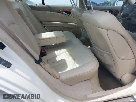 2003 Mercedes-Benz E-Class 3.2L with VIN WDBUF65J23A120318, listed as a IAAI auction lot 41927993 with 113,578 mi miles. Bid and sale history available at carsss.com. Image 8.