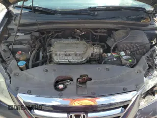 2005 Honda Odyssey EX-L z VIN 5FNRL38775B014777, wystawiony jako Copart lot #56245735 z przebiegiem 222 798 mil mil oraz Szkoda całkowita • Salvage title. Historia ofert i sprzedaży dostępna na DreamBid. Obrazek 12.