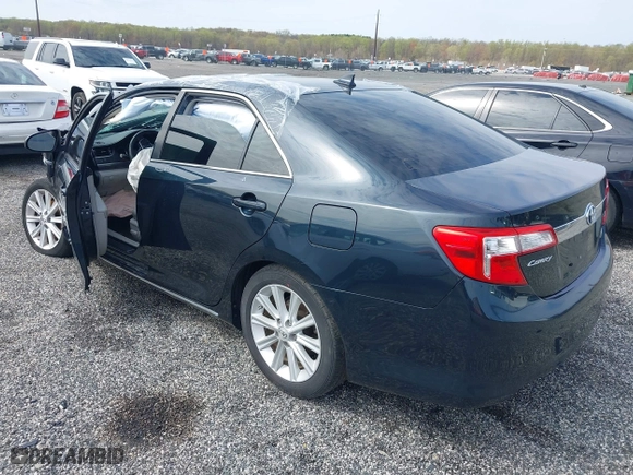 2013 Toyota Camry Hybrid LE with VIN 4T1BD1FK5DU076612, listed as a IAAI auction lot 42000025 with 210,000 mi miles. Bid and sale history available at carsss.com. Image 3.