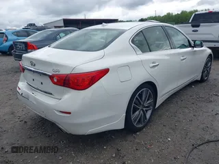 2014 Infiniti Q50 Premium with VIN JN1BV7AP3EM674807, listed as a IAAI auction lot 42003949 with 138,454 mi miles. Bid and sale history available at carsss.com. Image 4.