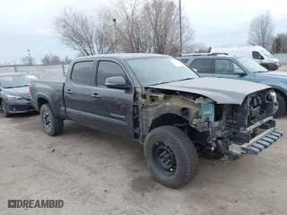 2016 Toyota Tacoma SR5 with VIN 3TMDZ5BN3GM010607, listed as a IAAI auction lot 41757738 with 154,686 mi miles. Bid and sale history available at carsss.com. Image 1.
