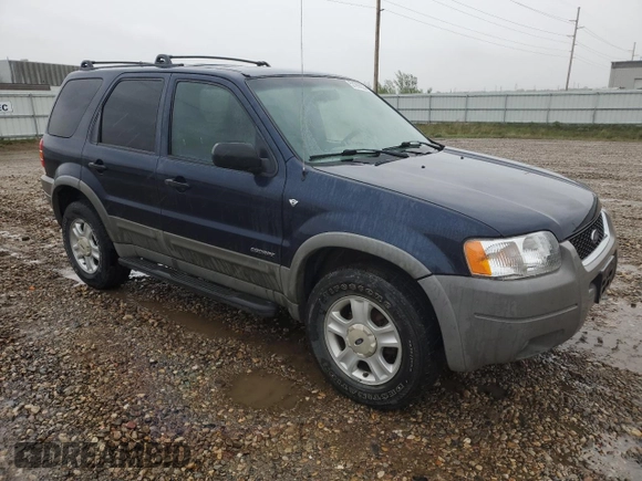 2002 Ford Escape XLT Choice with VIN 1FMYU04182KD34094, listed as a Copart auction lot 57299225 with 154,784 mi miles and Salvage title. Bid and sale history available at DreamBid. Image 4.