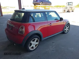 2008 MINI Hardtop with VIN WMWMF33588TT64697, listed as a IAAI auction lot 41831695 with 143,462 mi miles and . Bid and sale history available at DreamBid. Image 4.