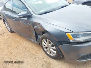 2011 Volkswagen Jetta SE with VIN 3VWDX7AJ4BM330203, listed as a IAAI auction lot 42256889 with 209,557 mi miles and . Bid and sale history available at DreamBid. Image 13.