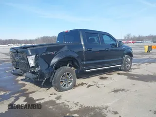 2015 Ford F-150 XLT with VIN 1FTEW1EG8FFB31487, listed as a IAAI auction lot 41609774 with 175,030 mi miles. Bid and sale history available at carsss.com. Image 4.