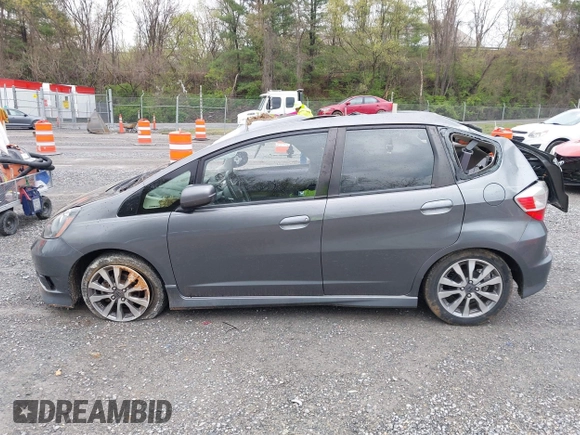 2013 Honda Fit Sport with VIN JHMGE8H56DC029276, listed as a IAAI auction lot 42002632 with 199,549 mi miles. Bid and sale history available at carsss.com. Image 14.