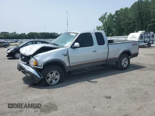 2002 Ford F-150 XL z VIN 1FTRX18L02NA82406, wystawiony jako Copart lot #59227795 z przebiegiem 197 337 mil mil oraz Szkoda całkowita • Salvage title. Historia ofert i sprzedaży dostępna na DreamBid. Obrazek 1.