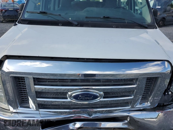 2012 Ford Econoline Passenger XL with VIN 1FBSS3BL1CDA04393, listed as a Copart auction lot 70426984 with 113,326 mi miles and Salvage Title. Bid and sale history available at DreamBid. Image 13.