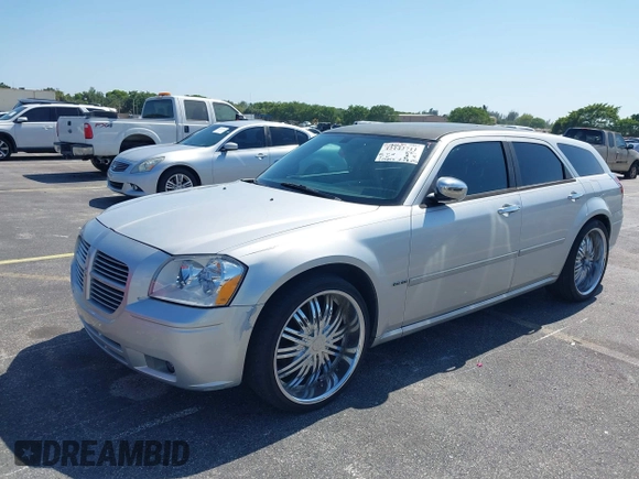 2006 Dodge Magnum R/T z VIN 2D4GV57256H374048, wystawiony jako IAAI lot #42142711 z przebiegiem 173 817 mil mil oraz . Historia ofert i sprzedaży dostępna na DreamBid. Obrazek 2.