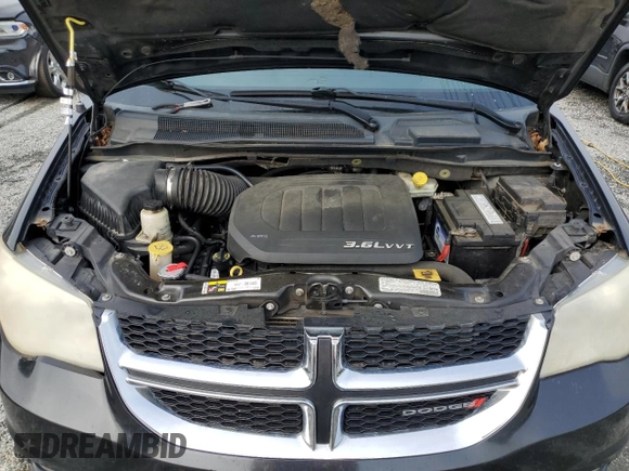 2013 Dodge Grand Caravan Crew with VIN 2C4RDGDG3DR693167, listed as a Copart auction lot 51666045 with 168,251 mi miles and Salvage Title. Bid and sale history available at DreamBid. Image 12.