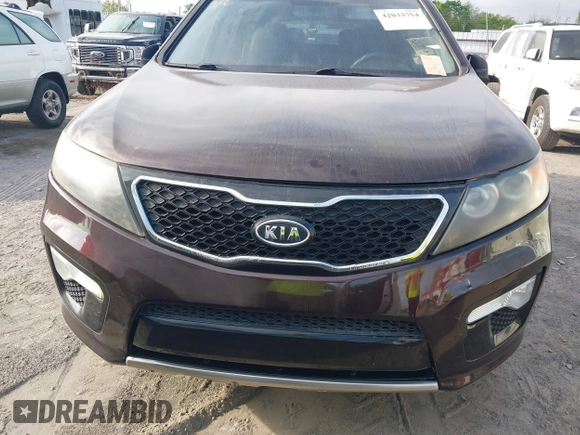 2011 Kia Sorento SX with VIN 5XYKW4A28BG127753, listed as a IAAI auction lot 42033754 with 163,470 mi miles. Bid and sale history available at carsss.com. Image 6.