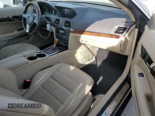 2012 Mercedes-Benz E 350 with VIN WDDKK5KF0CF147749, listed as a Copart auction lot 84523024 with 61,589 mi miles and Salvage Title. Bid and sale history available at DreamBid. Image 8.