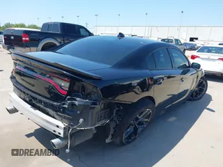 2021 Dodge Charger R/T with VIN 2C3CDXCT4MH684900, listed as a IAAI auction lot 41992358 with 71,386 mi miles and . Bid and sale history available at DreamBid. Image 4.