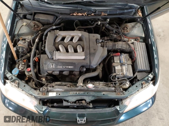 2000 Honda Accord LX z VIN 1HGCG1647YA096449, wystawiony jako Copart lot #54728065 z przebiegiem Nie podano mil oraz Czysty tytuł • Clean title. Historia ofert i sprzedaży dostępna na DreamBid. Obrazek 11.