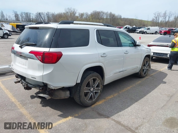 2017 GMC Acadia Denali with VIN 1GKKNXLS8HZ325734, listed as a IAAI auction lot 42097488 with 96,612 mi miles and . Bid and sale history available at DreamBid. Image 4.