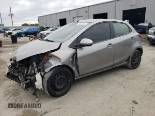 2012 Mazda 2 Sport with VIN JM1DE1KY1C0140803, listed as a Copart auction lot 83420714 with 153,730 mi miles and Salvage Title. Bid and sale history available at DreamBid. Image 1.