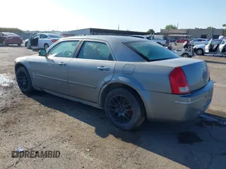 2006 Chrysler 300 Touring with VIN 2C3LA53G66H170047, listed as a IAAI auction lot 42135663 with 215,285 mi miles. Bid and sale history available at carsss.com. Image 3.