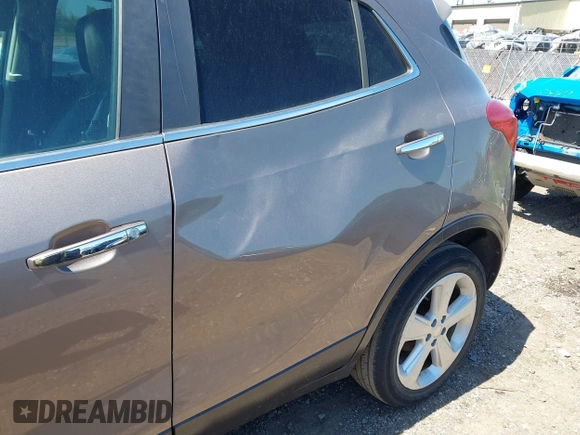2015 Buick Encore with VIN KL4CJASB5FB036319, listed as a IAAI auction lot 42242748 with 106,579 mi miles and . Bid and sale history available at DreamBid. Image 6.
