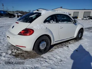 2014 Volkswagen Beetle with VIN 3VWHX7AT1EM617442, listed as a Copart auction lot 89093225 with 74,146 mi miles and Salvage Title. Bid and sale history available at DreamBid. Image 3.