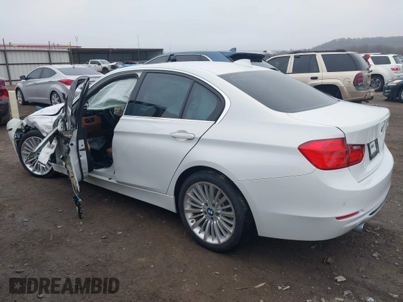 2014 BMW 3 Series 335i with VIN WBA3A9G50ENS65136, listed as a IAAI auction lot 41504021 with 60,892 mi miles. Bid and sale history available at carsss.com. Image 3.