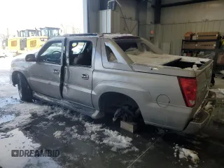 2004 Cadillac Escalade EXT z VIN 3GYEK62N34G324955, wystawiony jako Copart lot #87479764 z przebiegiem 218 127 mil mil oraz Szkody całkowita. Historia ofert i sprzedaży dostępna na DreamBid. Obrazek 2.