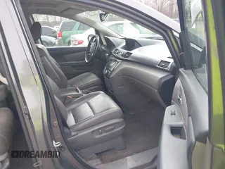 2014 Honda Odyssey Touring with VIN 5FNRL5H94EB020257, listed as a IAAI auction lot 41924245 with 204,526 mi miles and . Bid and sale history available at DreamBid. Image 5.