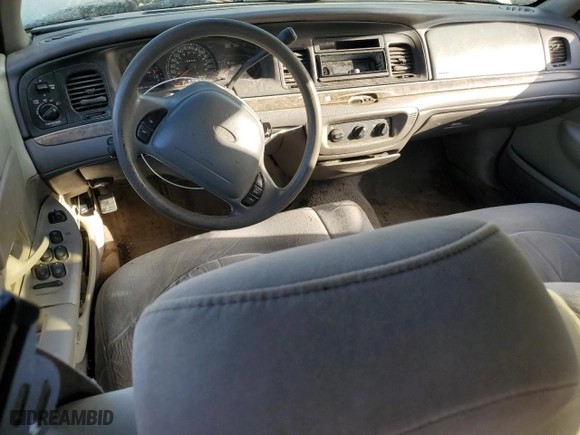 2000 Ford Crown Victoria with VIN 2FAFP73W5YX181565, listed as a Copart auction lot 77098594 with 180,439 mi miles and Salvage Title. Bid and sale history available at carsss.com. Image 8.