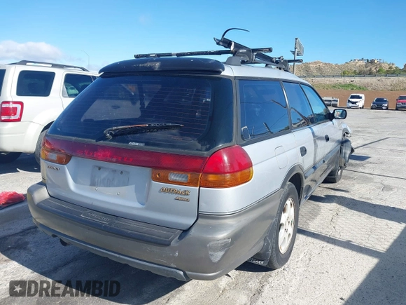 1999 Subaru Legacy Outback z VIN 4S3BG6850X6621723, wystawiony jako IAAI lot #41932992 z przebiegiem 283 200 mil mil oraz . Historia ofert i sprzedaży dostępna na DreamBid. Obrazek 4.