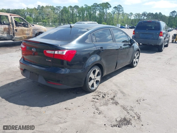 2016 Kia Rio EX with VIN KNADN4A34G6575984, listed as a IAAI auction lot 42133630 with 126,704 mi miles. Bid and sale history available at carsss.com. Image 4.