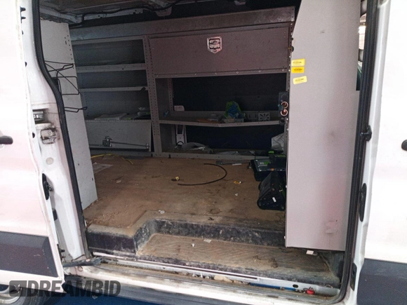 2015 Ford Transit Cargo with VIN 1FTNE1YM4FKA87516, listed as a IAAI auction lot 42901216 with 269,921 mi miles and . Bid and sale history available at DreamBid. Image 3.