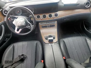 2019 Mercedes-Benz E 300 with VIN WDDZF4JB2KA618999, listed as a Copart auction lot 56915465 with 64,077 mi miles and Salvage title. Bid and sale history available at DreamBid. Image 8.