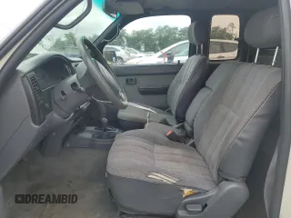 1996 Toyota Tacoma with VIN 4TAWN72N6TZ098086, listed as a Copart auction lot 64566685 with 379,805 mi miles and Salvage title. Bid and sale history available at DreamBid. Image 7.