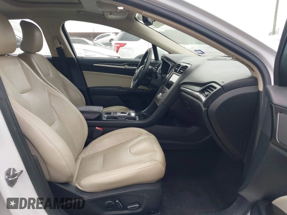 2017 Ford Fusion Titanium z VIN 3FA6P0K96HR124146, wystawiony jako IAAI lot #42428041 z przebiegiem 204 306 mil mil oraz . Historia ofert i sprzedaży dostępna na DreamBid. Obrazek 5.