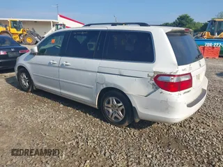 2007 Honda Odyssey EX-L z VIN 5FNRL38617B415770, wystawiony jako IAAI lot #42208632 z przebiegiem 269 375 mil mil oraz . Historia ofert i sprzedaży dostępna na DreamBid. Obrazek 3.
