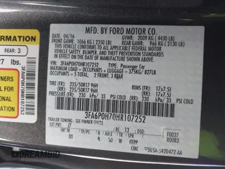 2017 Ford Fusion SE with VIN 3FA6P0H70HR107252, listed as a IAAI auction lot 42041332 with 121,255 mi miles. Bid and sale history available at carsss.com. Image 9.