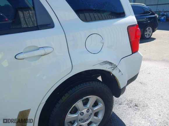 2008 Mazda Tribute Touring with VIN 4F2CZ961X8KM09873, listed as a IAAI auction lot 41886382 with 93,922 mi miles. Bid and sale history available at carsss.com. Image 6.