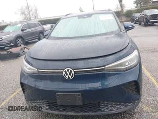 2023 Volkswagen ID.4 Pro z VIN 1V2CMPE88PC028158, wystawiony jako IAAI lot #41538391 z przebiegiem 7159 mil mil oraz . Historia ofert i sprzedaży dostępna na DreamBid. Obrazek 13.