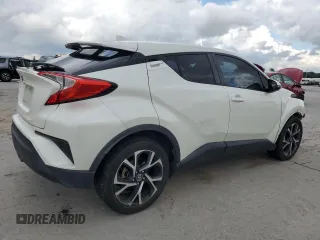 2018 Toyota C-HR XLE с VIN NMTKHMBX6JR016848, выставлен на аукционе Copart как лот 56939615 с пробегом 65 510 миль миль и Списание • Salvage title. История ставок и продаж доступна на DreamBid. Изображение 3.