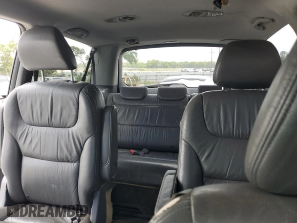 2005 Honda Odyssey EX-L z VIN 5FNRL38775B014777, wystawiony jako Copart lot #56245735 z przebiegiem 222 798 mil mil oraz Szkoda całkowita • Salvage title. Historia ofert i sprzedaży dostępna na DreamBid. Obrazek 10.