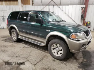 2000 Mitsubishi Montero Sport LS with VIN JA4MT31H2YP811973, listed as a Copart auction lot 42256035 with 164,863 mi miles and Salvage Title. Bid and sale history available at carsss.com. Image 4.