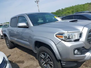 2017 Toyota Tacoma SR5 with VIN 5TFAZ5CN3HX042874, listed as a IAAI auction lot 42022752 with 104,013 mi miles and . Bid and sale history available at carsss.com. Image 13.