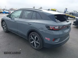 2023 Volkswagen ID.4 S z VIN 1V25MPE80PC051099, wystawiony jako IAAI lot #41332507 z przebiegiem 12 037 mil mil oraz . Historia ofert i sprzedaży dostępna na DreamBid. Obrazek 3.