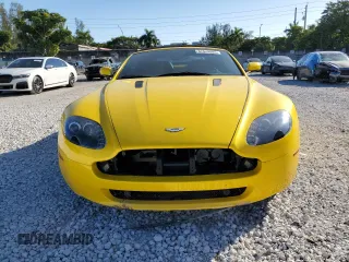 2009 Aston Martin Vantage z VIN SCFBF04C79GD12188, wystawiony jako Copart lot #45348405 z przebiegiem 29 580 mil mil oraz Szkoda całkowita • Salvage title. Historia ofert i sprzedaży dostępna na DreamBid. Obrazek 5.