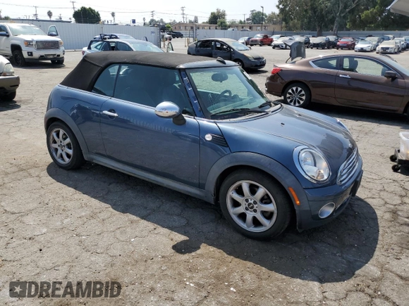 2010 MINI Convertible with VIN WMWMR3C51ATU97217, listed as a Copart auction lot 67732714 with 127,880 mi miles and Clean Title. Bid and sale history available at DreamBid. Image 4.