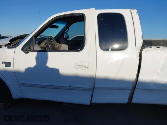 1999 Ford F-150 XL с VIN 1FTRX18L0XKB29703, выставлен на аукционе IAAI как лот 41644163 с пробегом Не указан миль и . История ставок и продаж доступна на DreamBid. Изображение 14.
