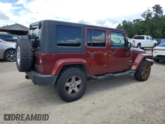 2007 Jeep Wrangler Unlimited Sahara with VIN 1J4GA591X7L118192, listed as a Copart auction lot 62357885 with 261,019 mi miles and Clean title. Bid and sale history available at DreamBid. Image 3.