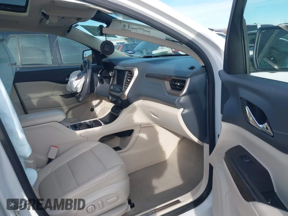 2020 GMC Acadia Denali with VIN 1GKKNXLS8LZ121704, listed as a IAAI auction lot 41665662 with 69,937 mi miles. Bid and sale history available at carsss.com. Image 5.
